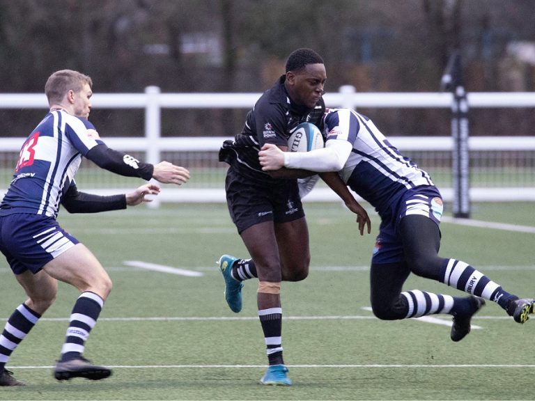 Bedford Athletic rugby player tackled by defending Sudbury player