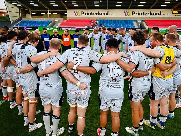 Bedford Blues group huddle