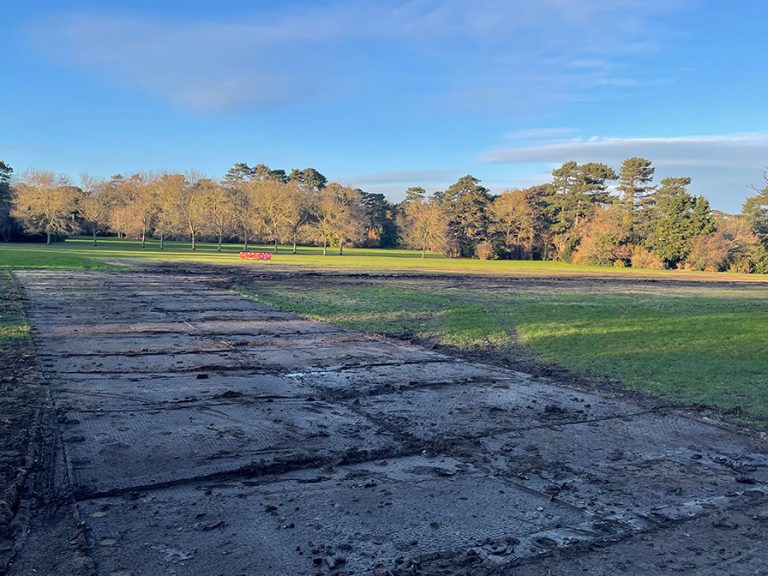 The grass in Bedford Park following Winter Wonderland