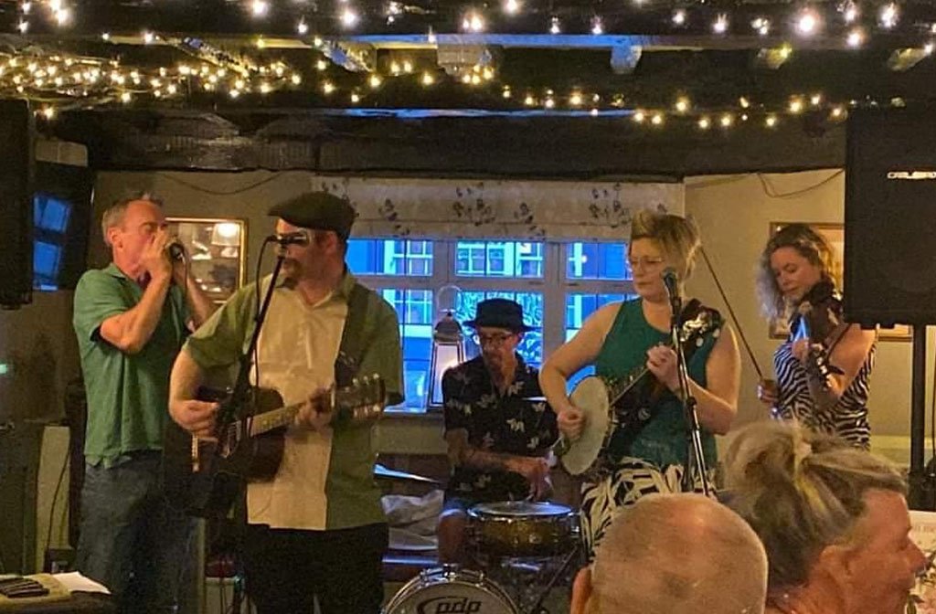 Irish folk band, The Black and Gold, perform in the cosy surroundings of the Castle pub in Bedford