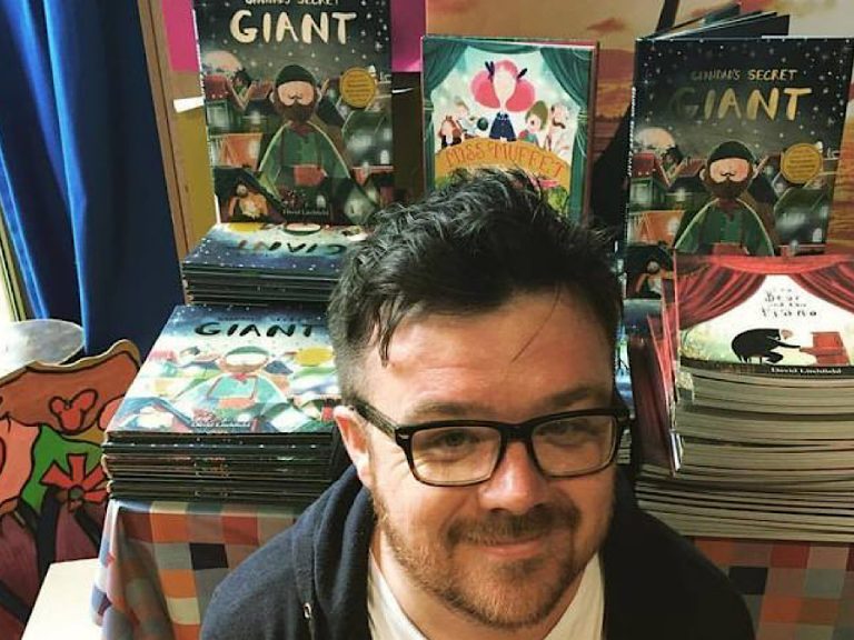 Bedford-based author David Litchfield surrounded by some of the books he's written and illustrated.