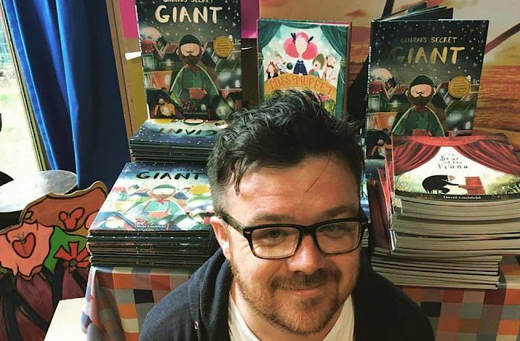Bedford-based author David Litchfield surrounded by some of the books he's written and illustrated.