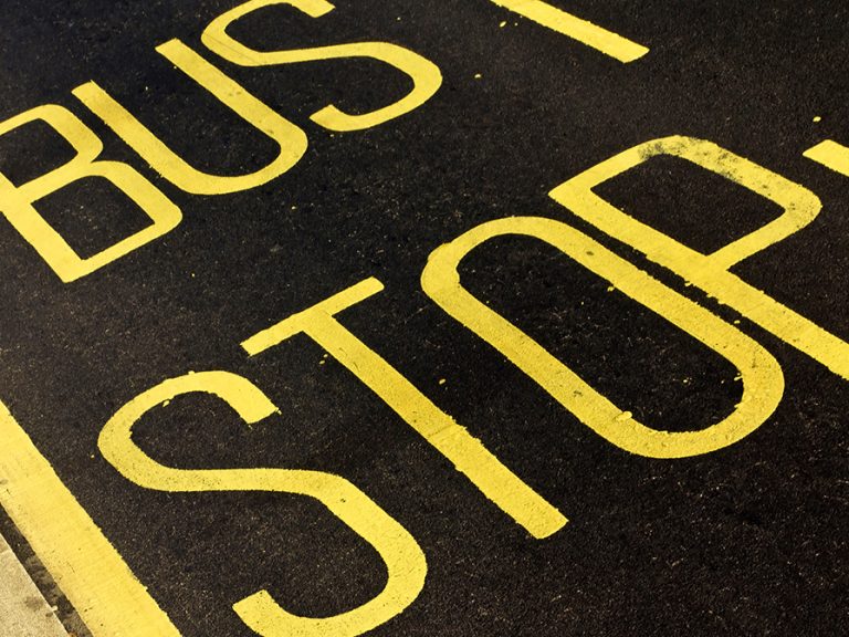 Bus Stop road marking in Yellow