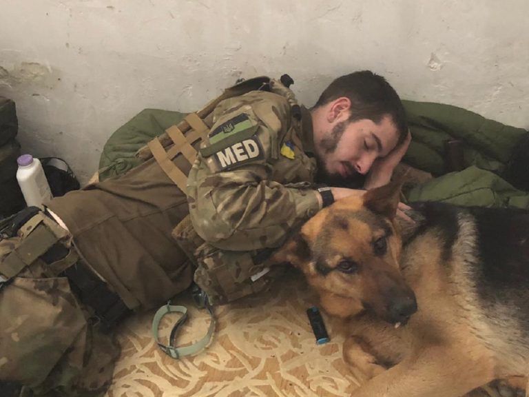 Connor Braithwaite taking a short and much-needed break with a K9 friend. Image: Connor Braithwaite