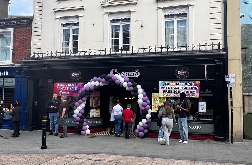 Creams Bedford decorated their shop front for the brand's 16th birthday. Image: Bedford Independent
