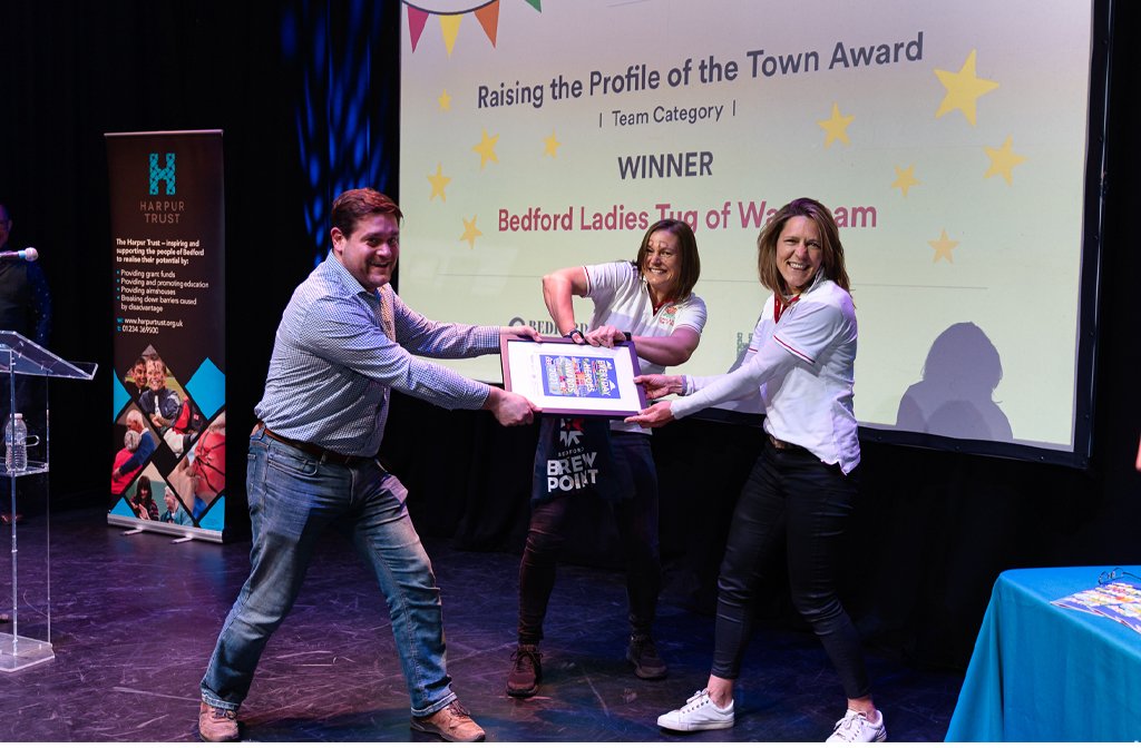 The winners, Bedford Ladies Tug of War team, with Martin Steers of Bedford Radio