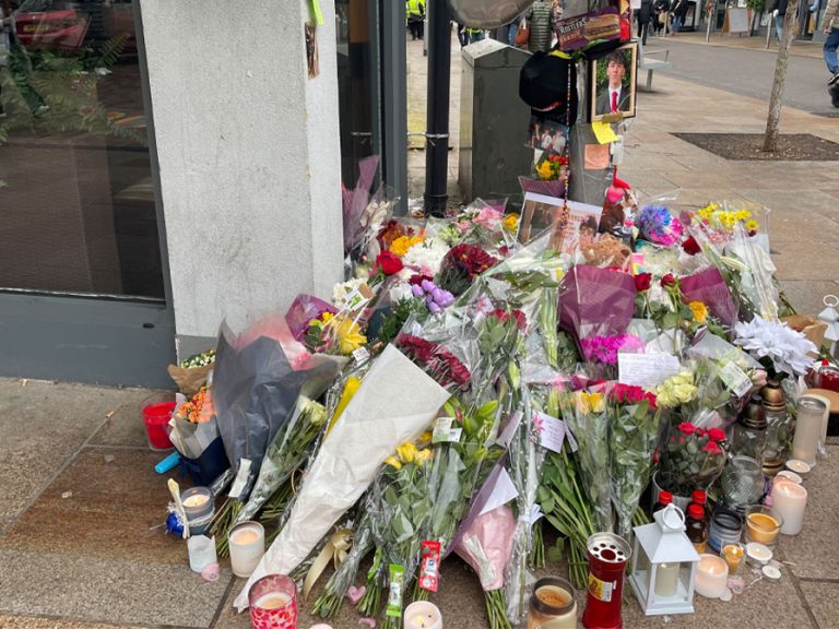 Flowers left near to where Thomas Taylor was murdered on Greenhill Street Image Bedford Independent
