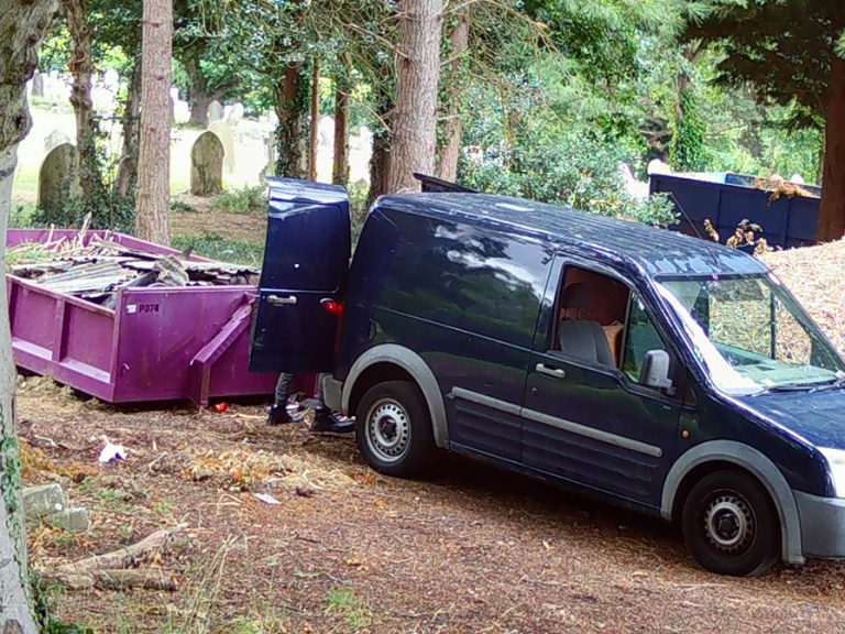 A blue van near a skip at Foster Hill Cemetery. Image: Bedford Borough Council