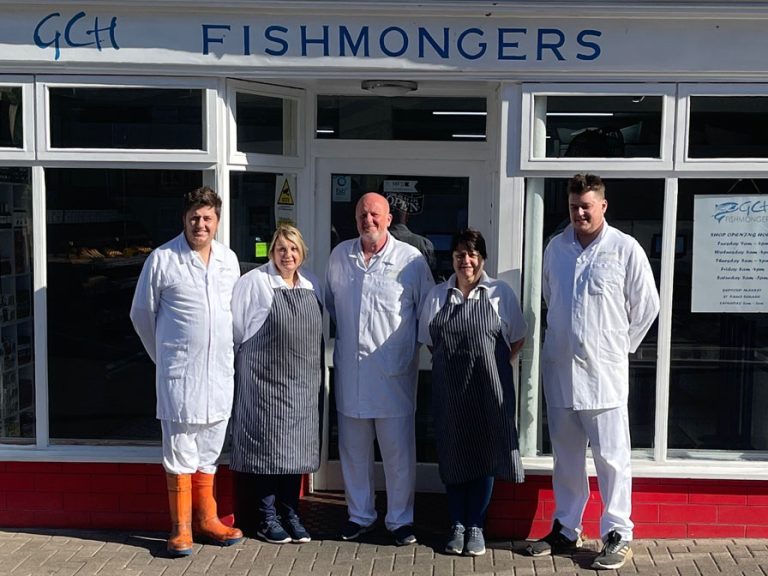 Gary Hooper of GCH Fishmongers pictured outside their shop on Newnham Street and surrounded by his team including his wife, sister-in-law and sons.