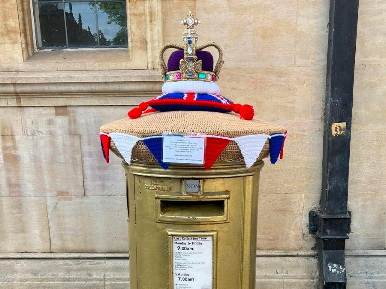 Gold postbox with crochet topper