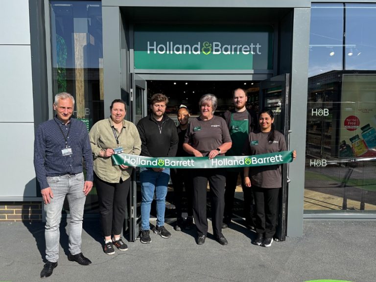 The staff of the new Holland & Barrett at Bedford Interchange at their store opening