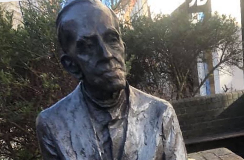 A close up of the bust of the apartheid activist Sir Trevor Huddlestone in Silve Square in Bedford