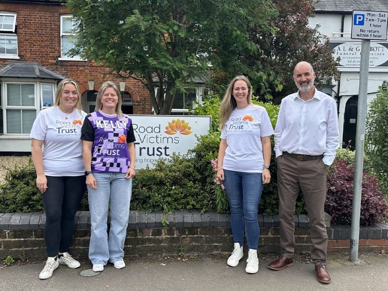 Jamie, Kelly & Cassie with Paul Cook of the Road Victims Trust. Image: RVT
