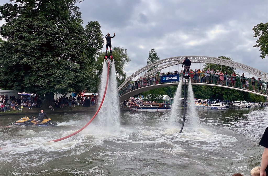 Jet Boots disply team performing in front of the suspension bridge on the River Great Ouse at the Bedford River Festival 2024. Image: Bedford Independent