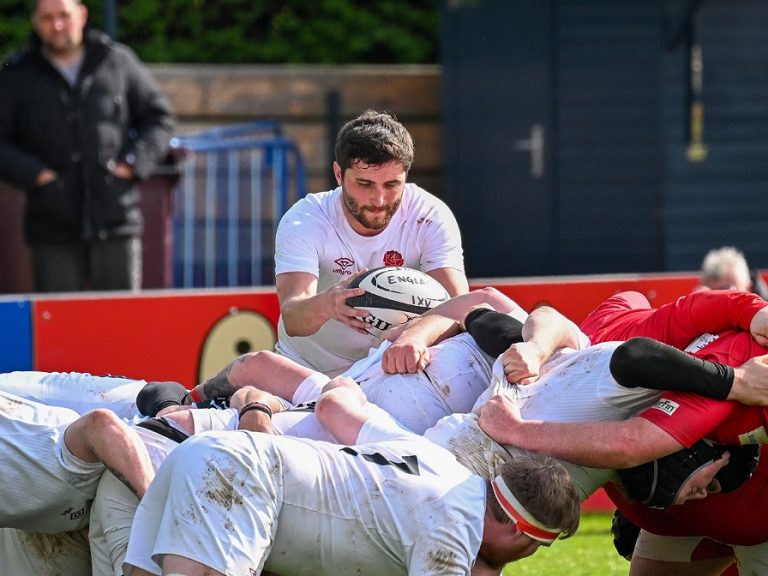 Lloyd Smith of England's Deaf rugby squad about to put the ball into a scrum in a game against Wales