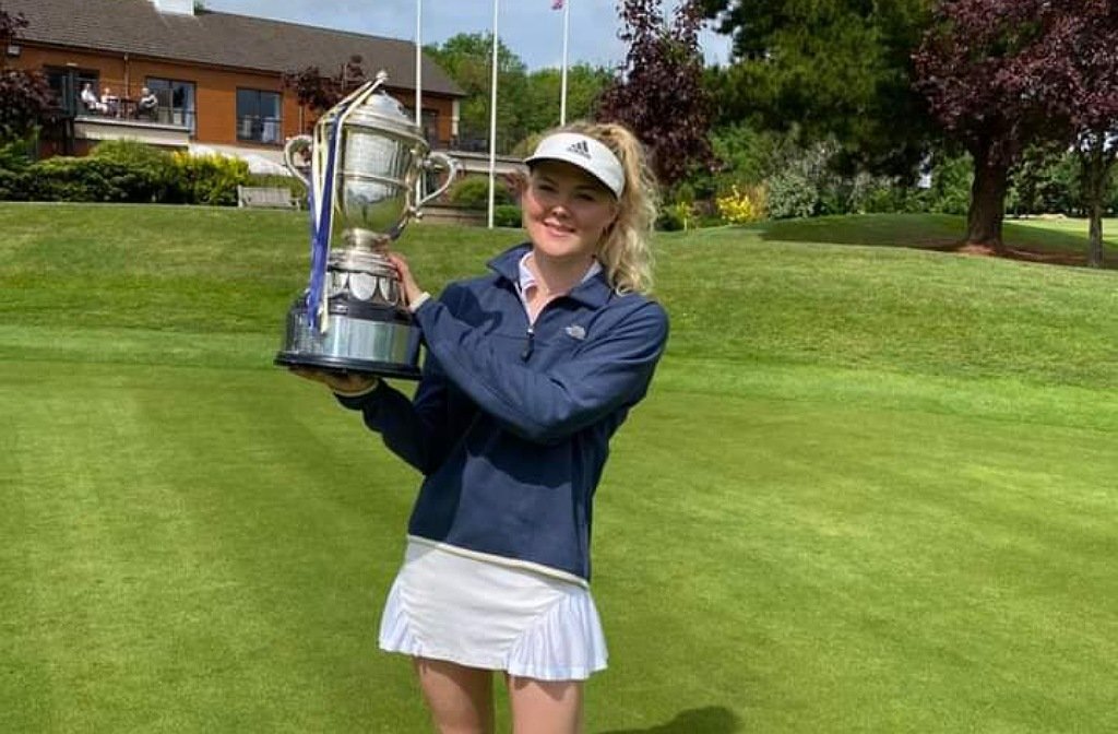 Luca Thompson holding her trophy