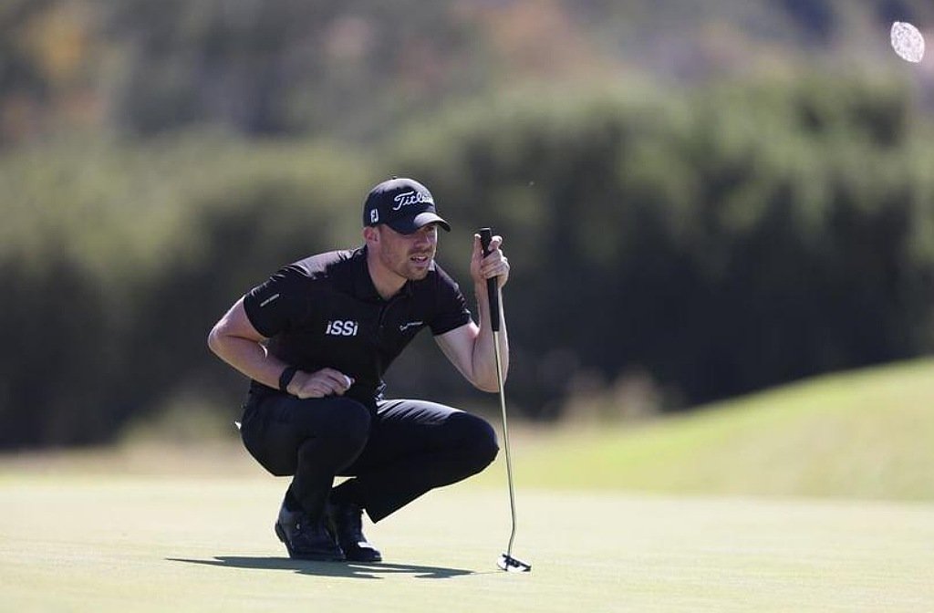 Nick Cunningham lining up a putt on the Sunshine Tour in South Africa