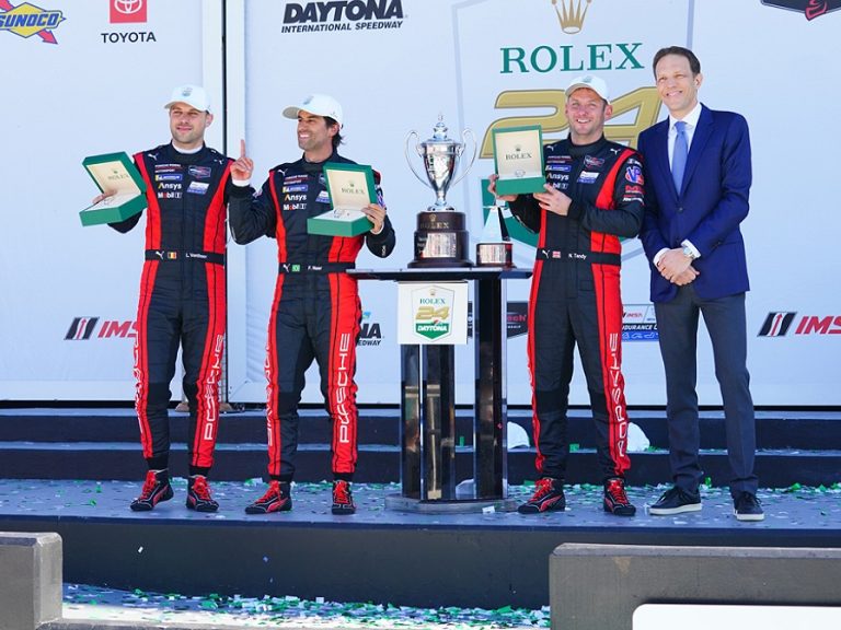 Nick Tandy (right) on the podium with his teammates at the Daytona 24-hour race in Florida