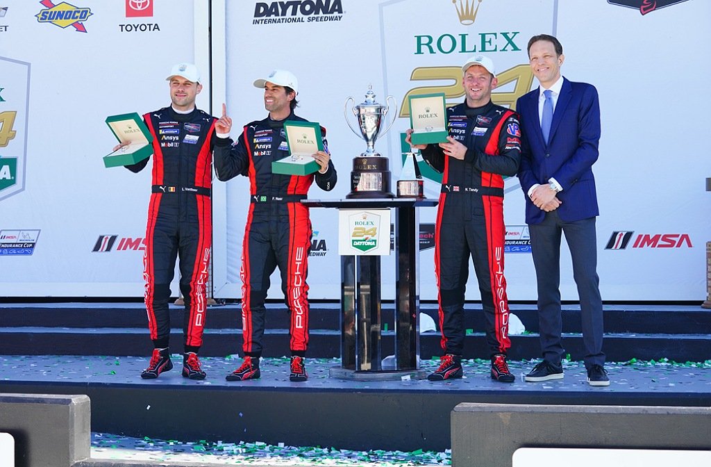 Nick Tandy (right) on the podium with his teammates at the Daytona 24-hour race in Florida