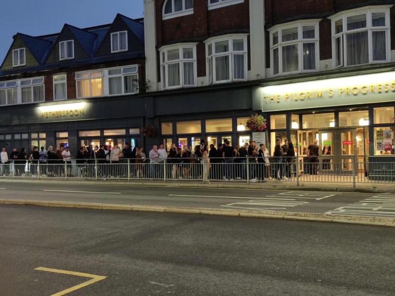 Pictures, like this one taken outside the Pilgrim's Progress pub in Bedford Town Centre, have forced the council to issue a reminder of social distancing guidelines. Image: @kevin27677521/Twitter
