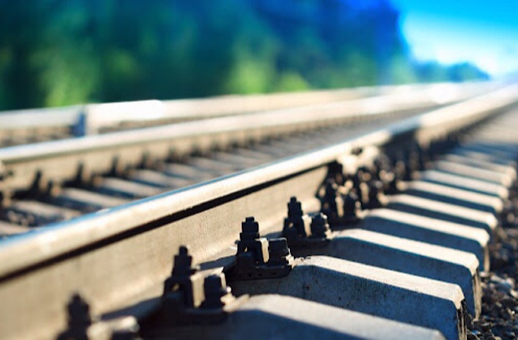 Diagonal countryside railway bokeh background