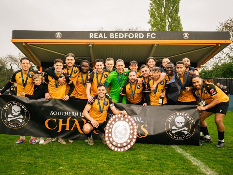 Real Bedford squad with the Southern League Central Division One trophy