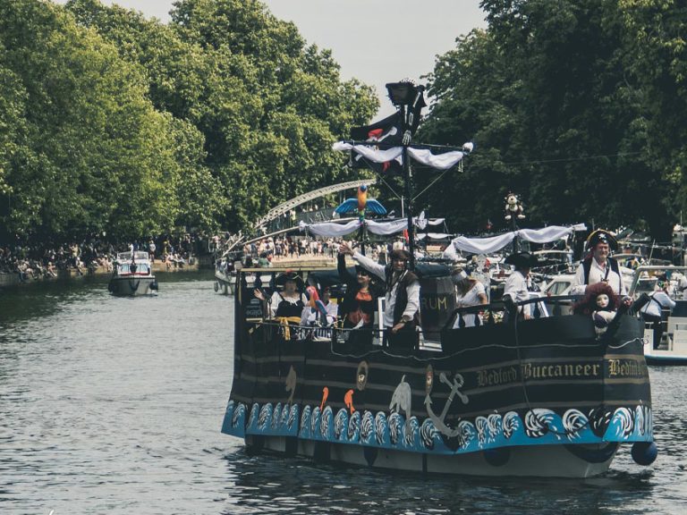 Decorative boat with pirates on the River Great Ouse at the Bedford River Festival