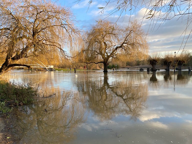River Great Ouse flooded with the butterfly bridge in the background January 2025 Image BEDSGovet