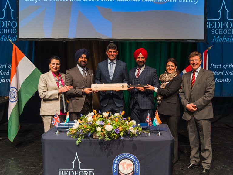 Sir Alistair Cook with delegates from Doon International Educational Society and Bedford School's James Hodgson. Image: Bedford School