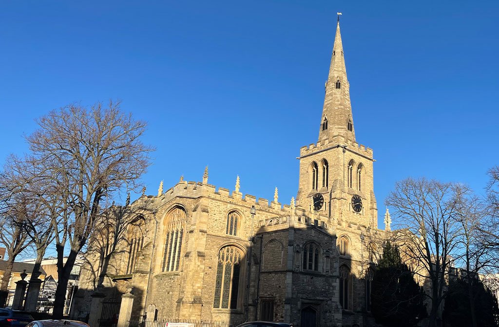 The exterior of St Pauls Church against a bright blue sky