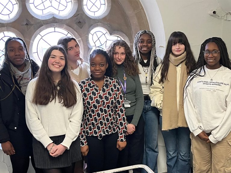a group photo of the eight students who make up the Learning Lounge.