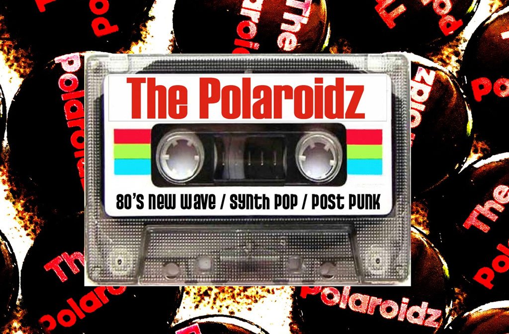 A cassette tape features the words The Plaroidz / 80s new wave/synth pop/post punk on a background of badgest that say The Polaroidz