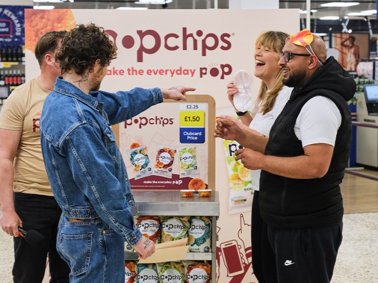 Tom Grennan with fans during a Popchips promotion at Bedford Tesco Cardington