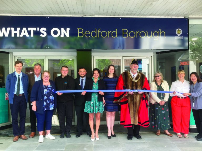 Mayor Tom Wootton with councillors and officers of Bedford Borough Council outside the new What's On Hub