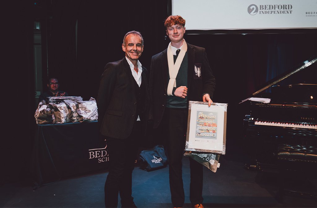 Young Achiever (14 to 21) winner Charlie Faulkner with Tim Pain of Bedford Heights