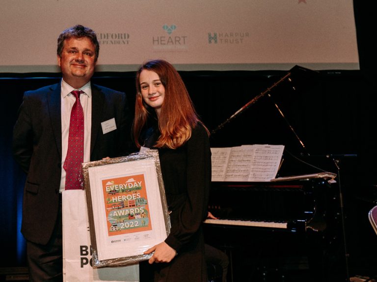 Young Carer of the Year Isla Keep (r) with David Morris from Heart Academies Trust at the Quarry Theatre for Bedford Independent Everyday Heroes Awards 2022