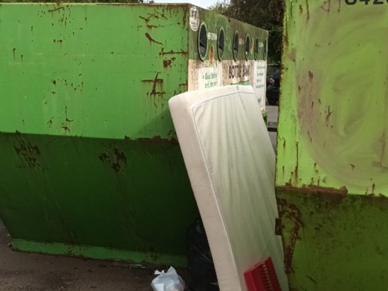 Fly tipped mattress by bottle banks