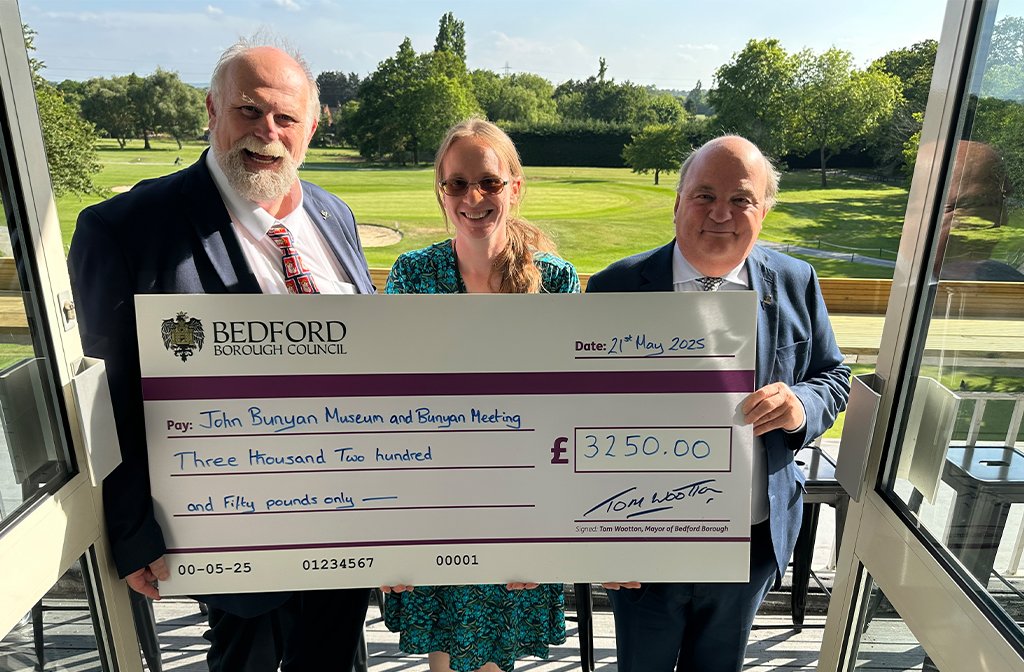 (l-r) Mayor Tom Wootton; Nicola Sherhod, director at John Bunyan Museum, cllr John Wheeler with their cheque. Image: LDRS