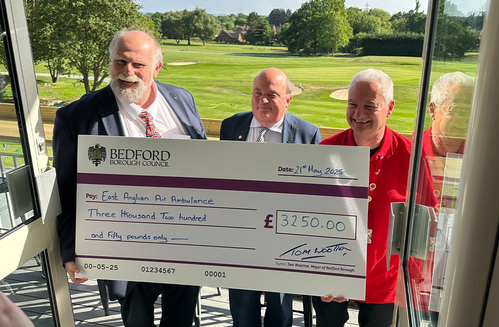 (l-r) Mayor Tom Wootton, cllr John Wheeler and Andy Lewis from East Anglian Air Ambulance (EAAA) with their cheque. Image: LDRS