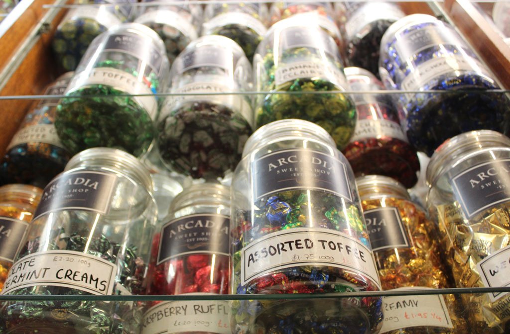Shelves full of traditional jars of sweets in Arcadia sweetshop