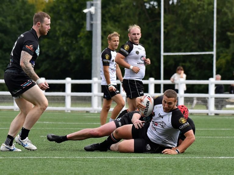 Bedford Tigers rugby league player stretches for the try line against North Herts Crusaders in August 2025