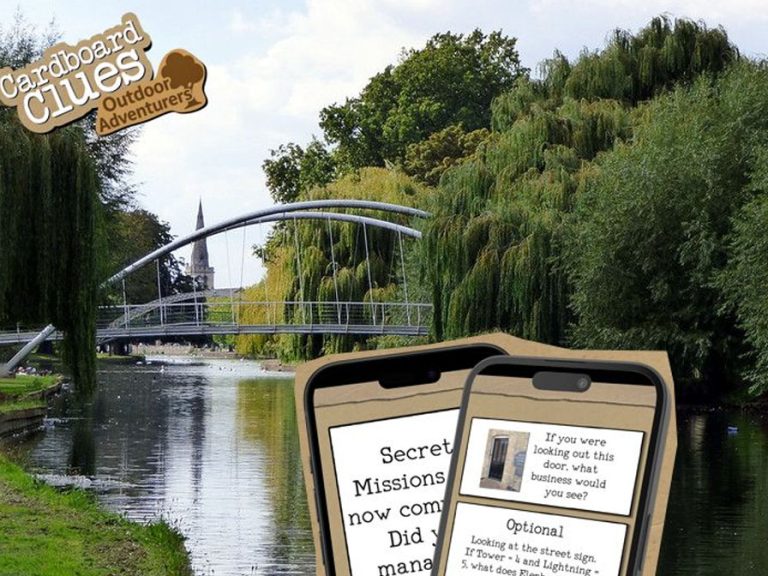 A shot of the riverside in Bedford with two mobile phones in the foreground with clues for the Riverside Ramble outdoor adventure.