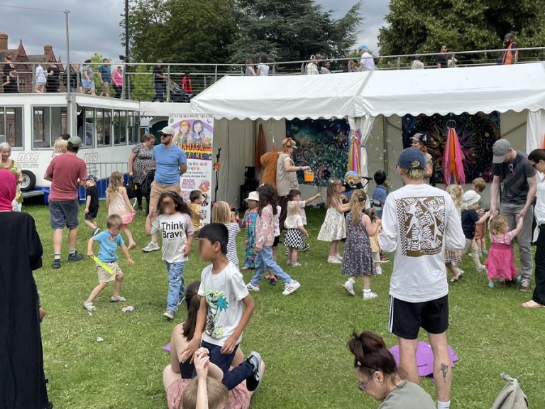 Families enjoying the fun at Kempston Family Day in Addison Howard Park