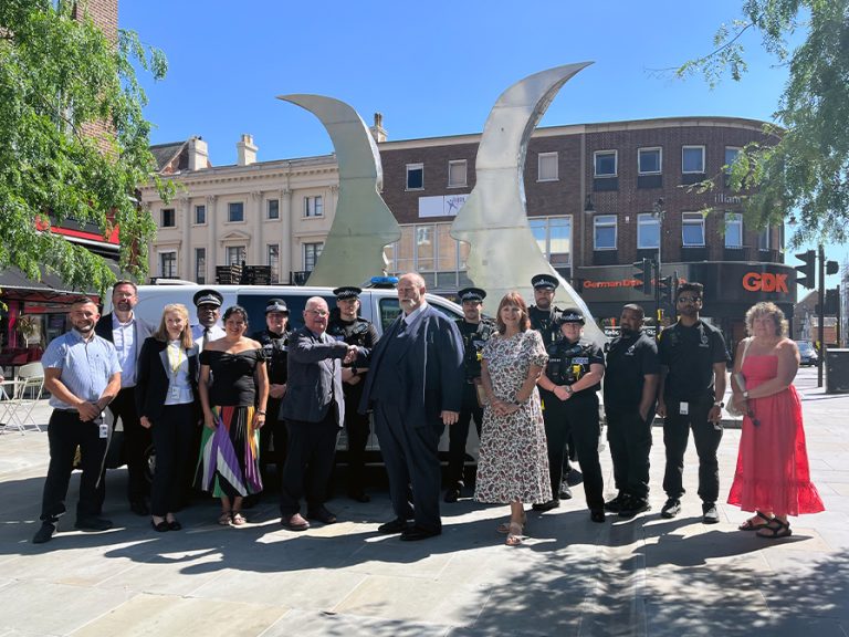 (c) Pcc John Tizard (l) shakes hands with Mayor of Bedford Tom Wootton as business owners, police officers and councillors help launch the Summer Policing Plan. Image: Bedford Independent