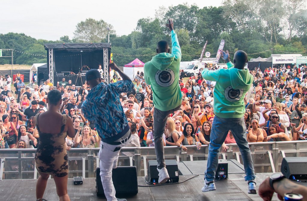 Four men are performing on stage at Original Culture Festival 2024