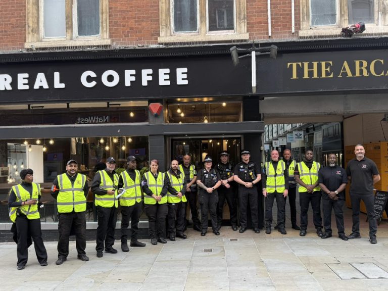 Private security team and members of Bedfordshire Police in the town centre on 2 August. Image Peter McCormack