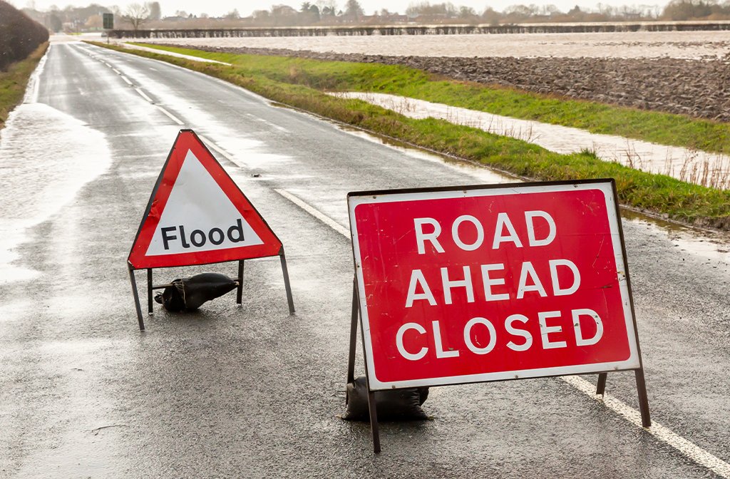 Road ahead closed flood Image Moorland Roamer Adobe Stock