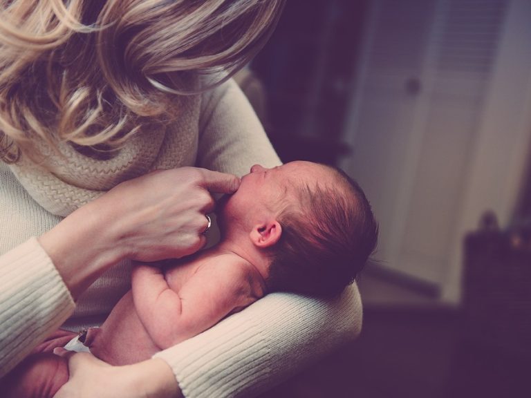 stock image of mother with new born baby