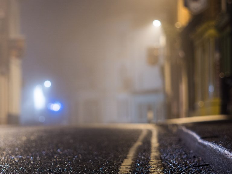 A street on a foggy winters night Image Raggedstone Shutterstock