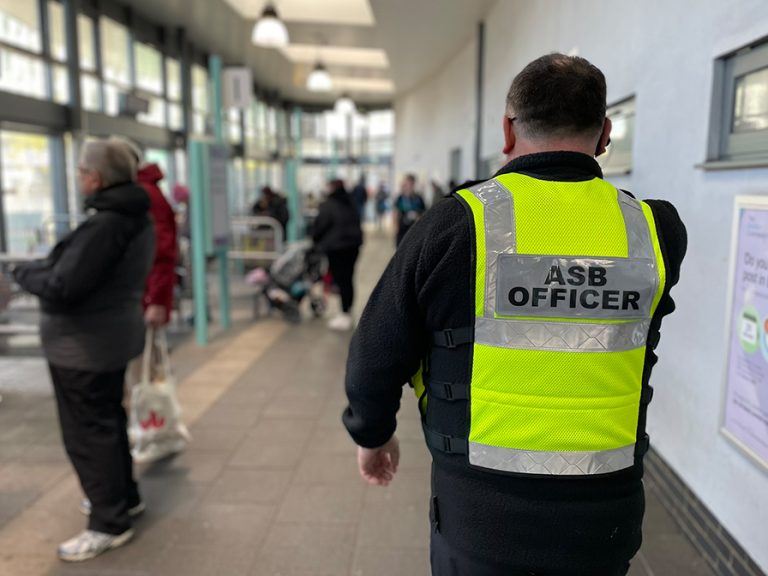 An ASB Officer in Bedford Bus Station. Image: Bedford Borough Council